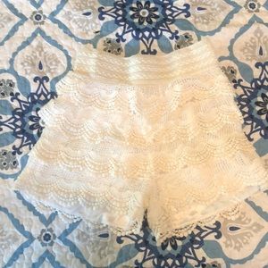 White lace shorts